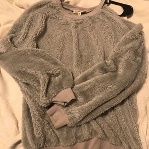 Listicle Grey cold shoulder fuzzy sweater